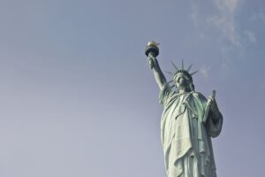 beautiful low angle shot statue liberty during daytime new york